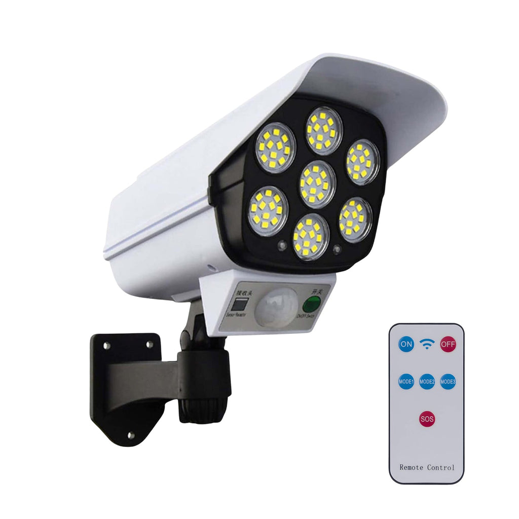 Motion-activated solar security camera light illuminating a dark outdoor area.
