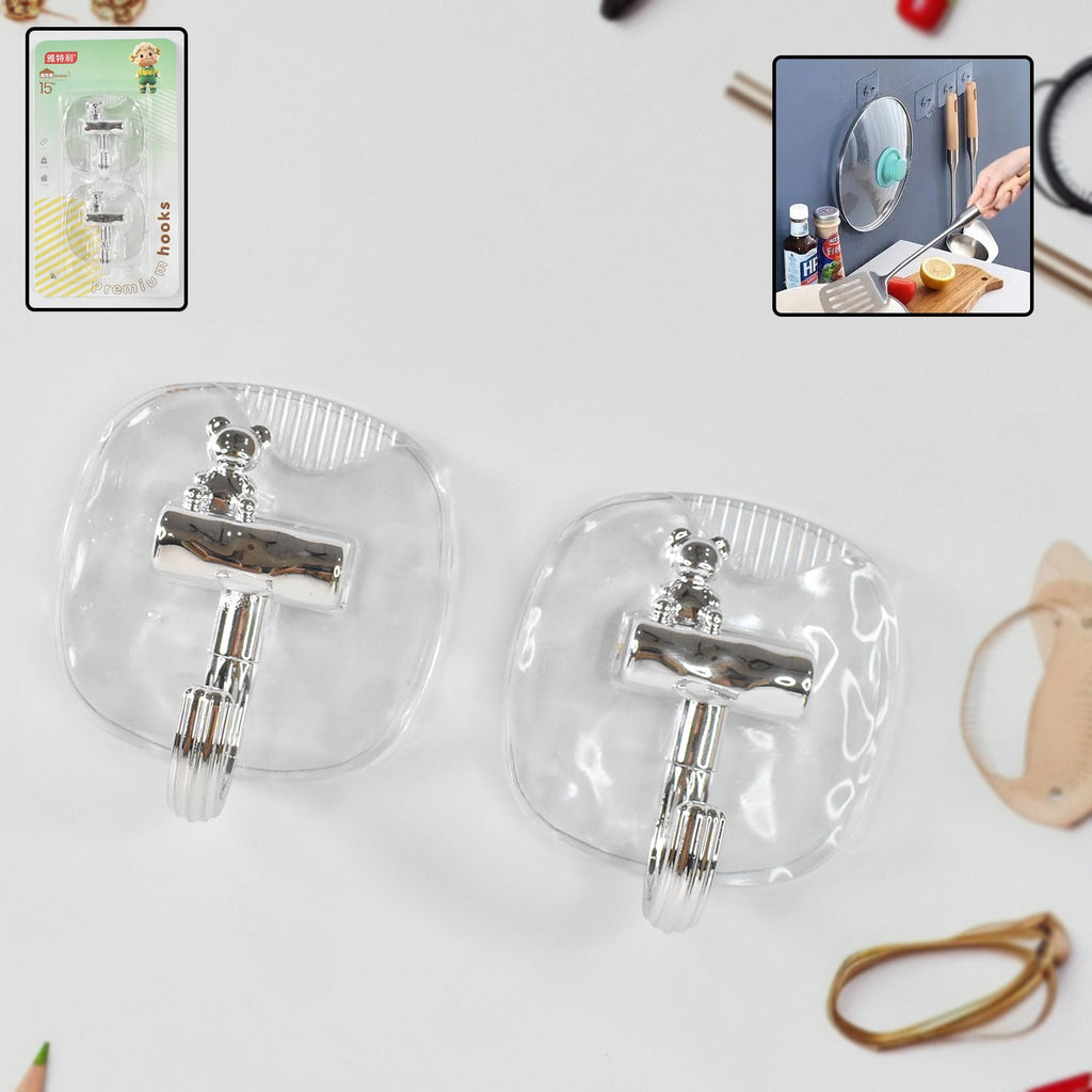Plastic self adhesive wall hook mounted on wall holding items
