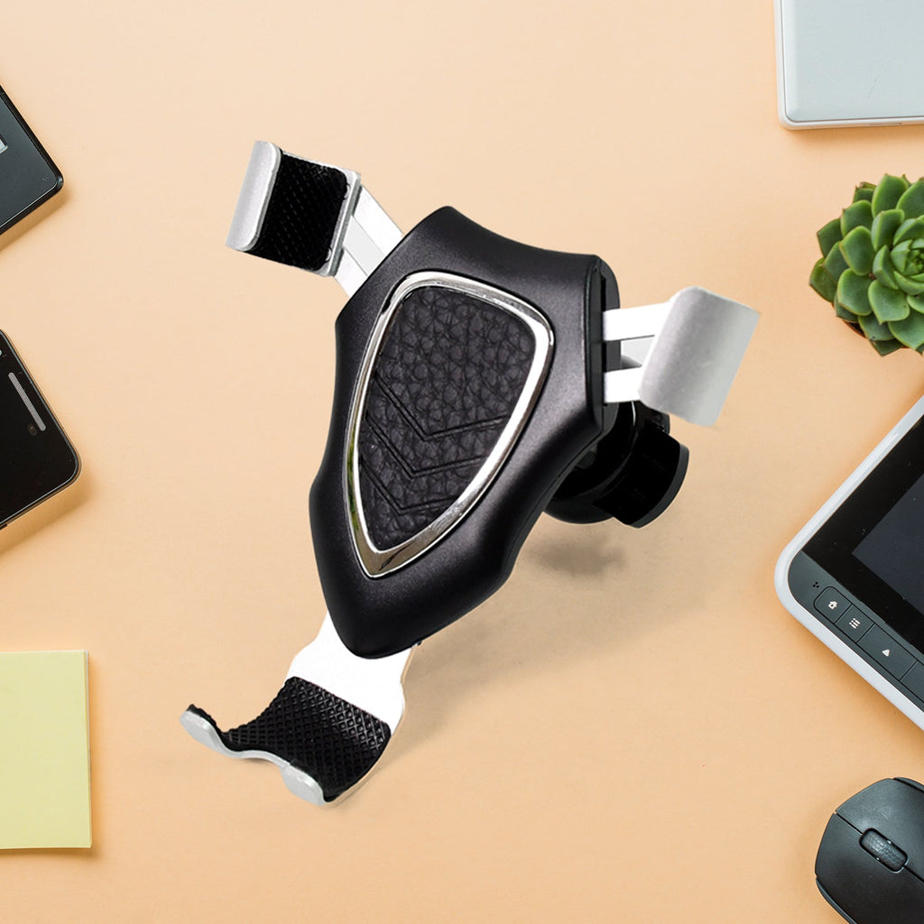 Gravity Car Phone Mount securely holding a smartphone on a dashboard.