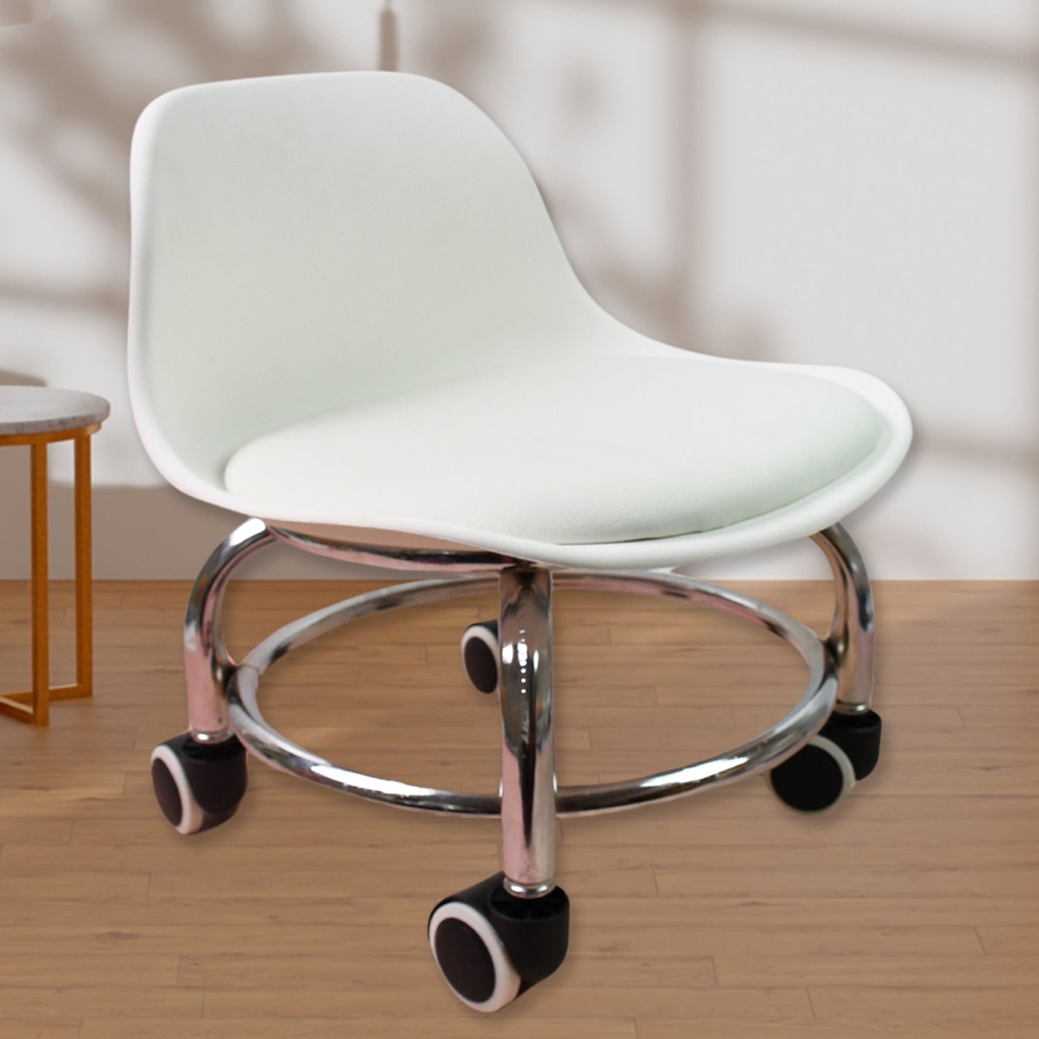 Compact and ergonomic rolling stool with wheels suitable for various home and office tasks.