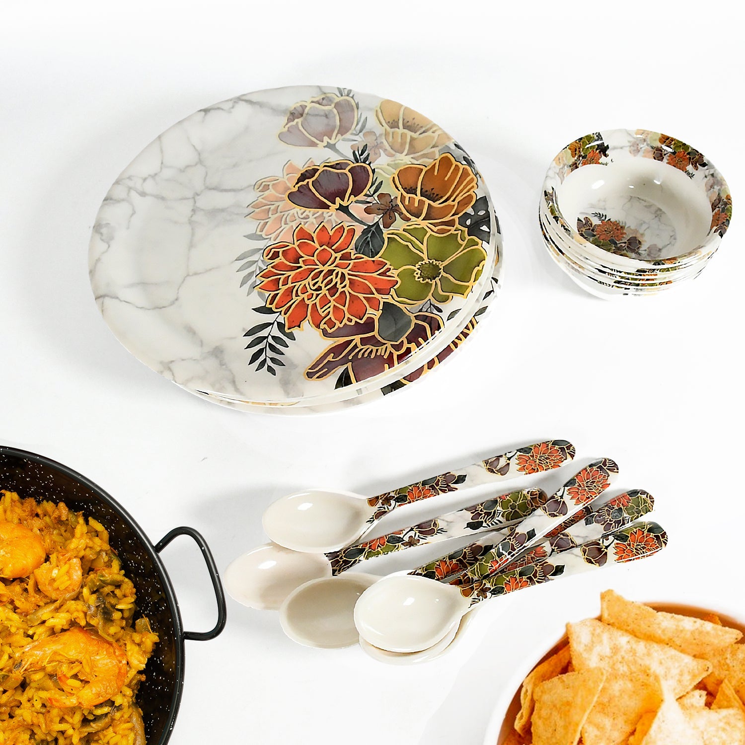 Stackable plastic plates and bowls, highlighting the space-saving design.