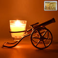 Top Cannon tealight candle holder with glowing candle for Diwali decorations