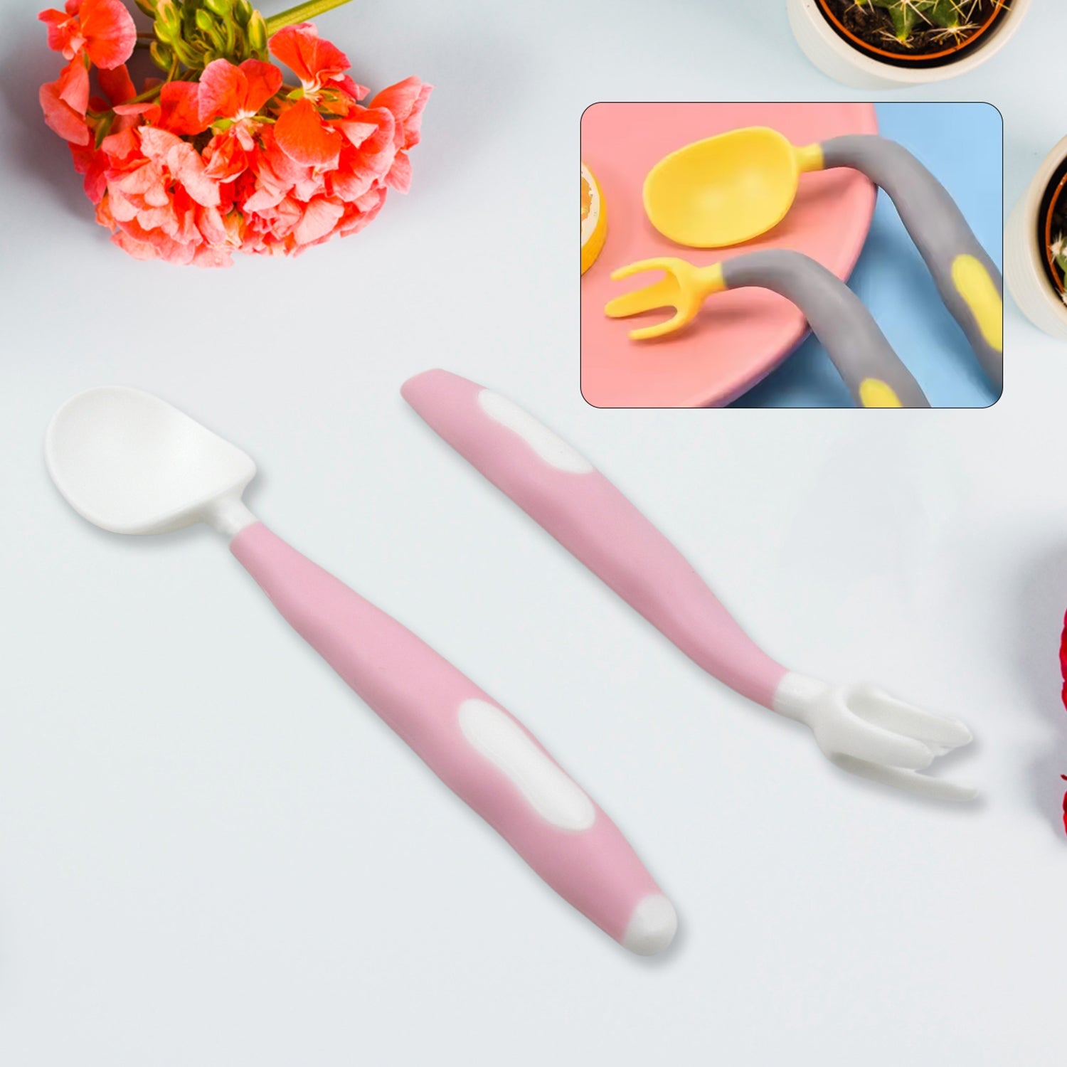 A vibrant yellow and blue bendable kids self-feeding utensil set with a travel case.