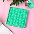 Premium silicone square Pop It fidget toy showing front view