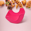 Silicone Burger Holder in use, keeping a hamburger neat.