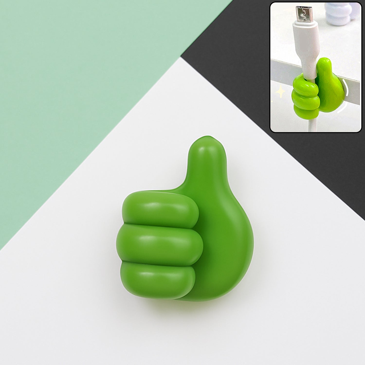 Green hand-shaped wall clip holder holding cables and keys securely