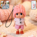 Cute mini doll keychain with knitted cap and vibrant outfit
