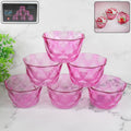 Diamond shape ice cream bowl set in clear plastic, elegantly styled for serving dessert.