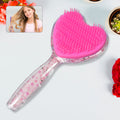 Heart shape hair brush in pink, shown with gentle bristles for kids and adults.