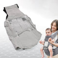 Ergonomic baby carrier with hip seat in a neutral color, front view.