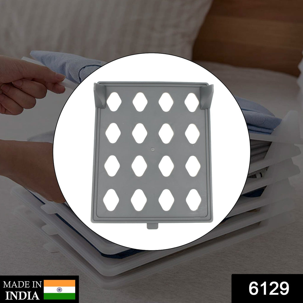 Efficient fabric storage solution for neatly stacking clothes in a household.