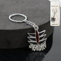 Front view of Mahakal metal keychain with spiritual symbol