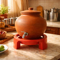 Close-up of the black lotus-shaped Matka Stand, showcasing its sturdy plastic design.