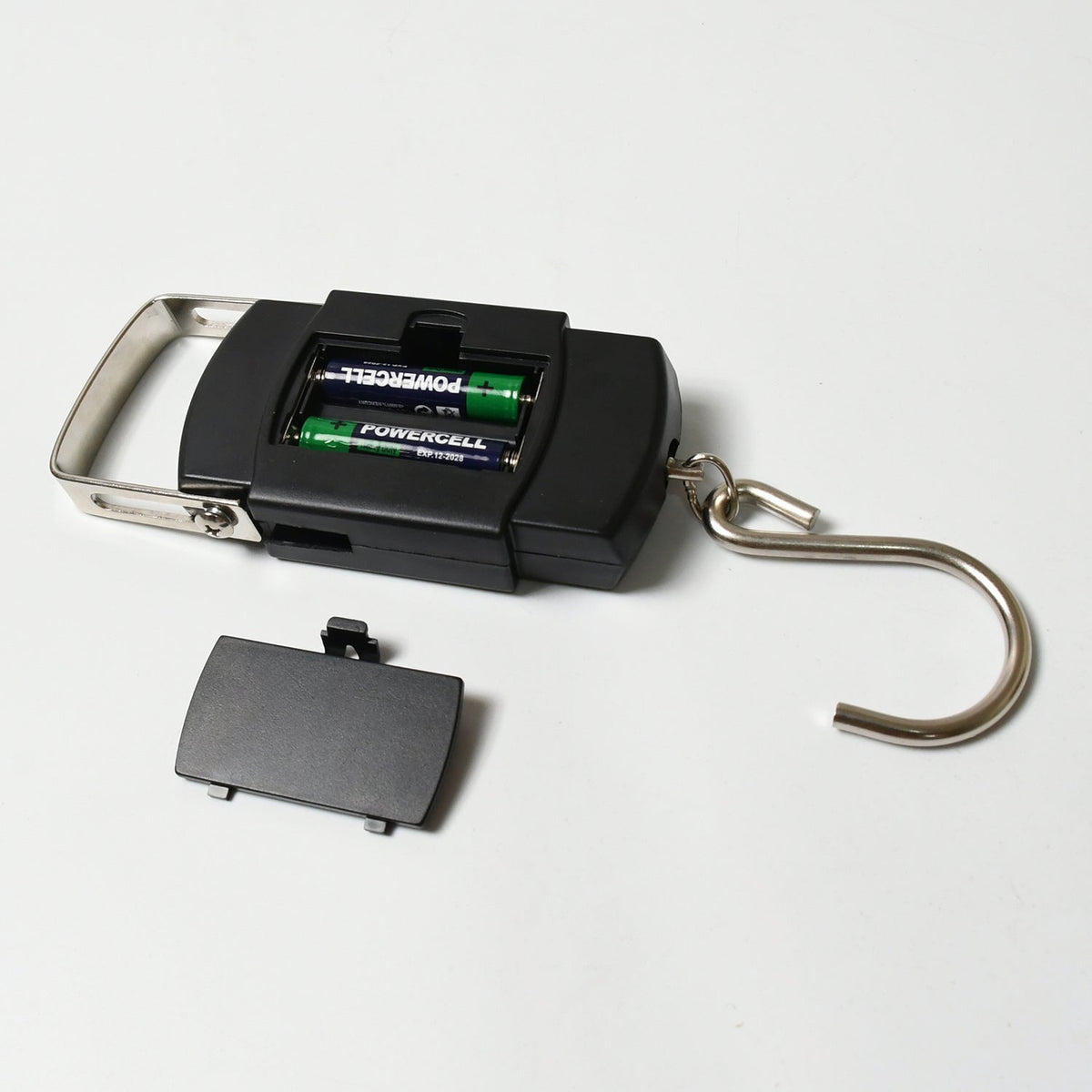 Hand holding the hook-type digital weighing scale, suitable for luggage.