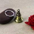 Close-up of Temple Bell Keychain highlighting durable metal charm