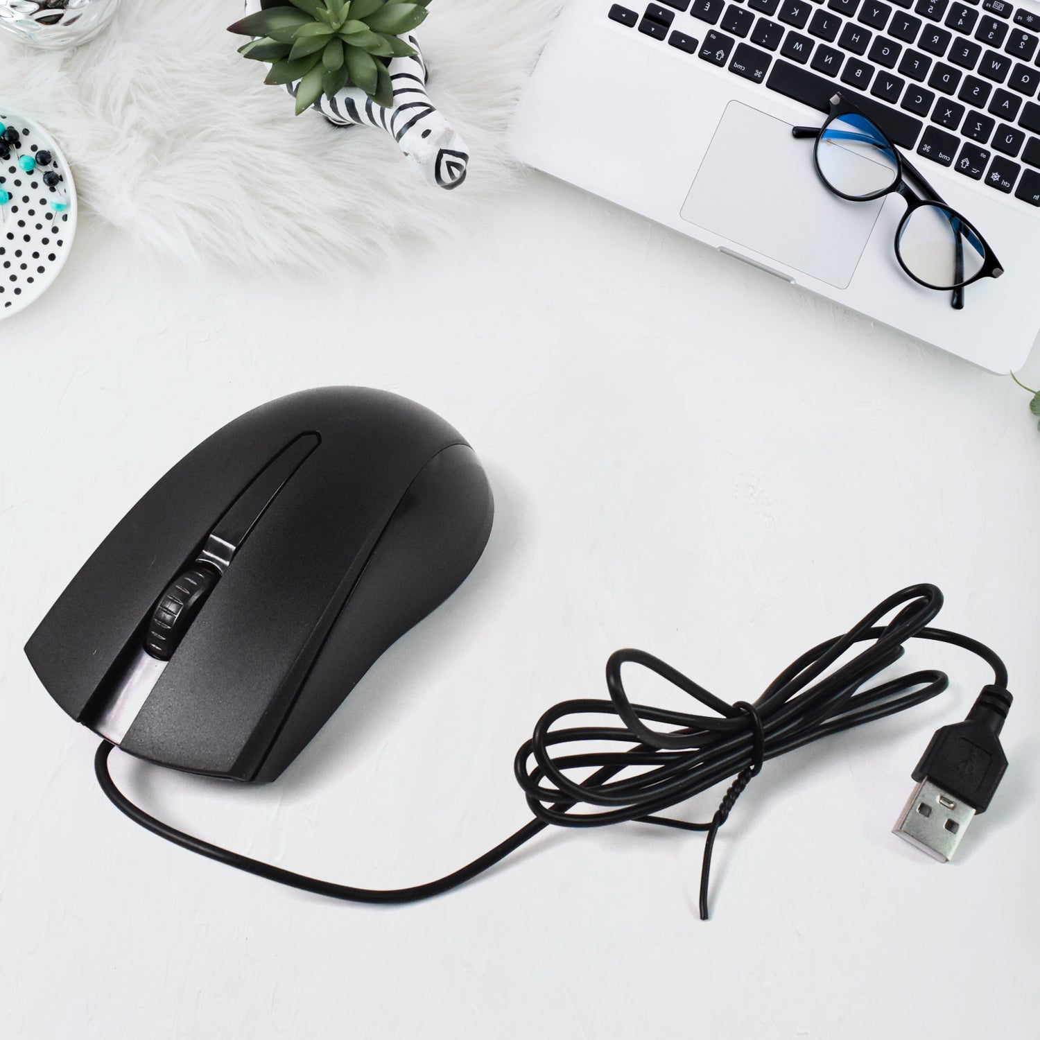 Compshop X2 Wired Optical Mouse with its sleek design on a clean white background.