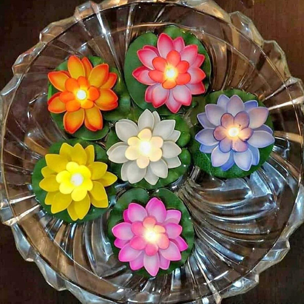 Floating Lotus LED Candles, flameless and safe, enhancing a home's festive decor.