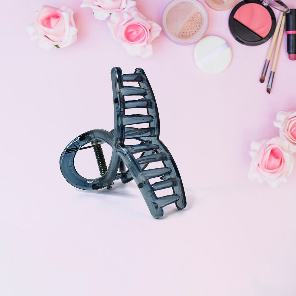 Close-up of matte plastic hair barrette clamp open