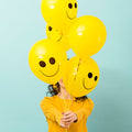 Vibrant smiley latex balloons for a cheerful party atmosphere.