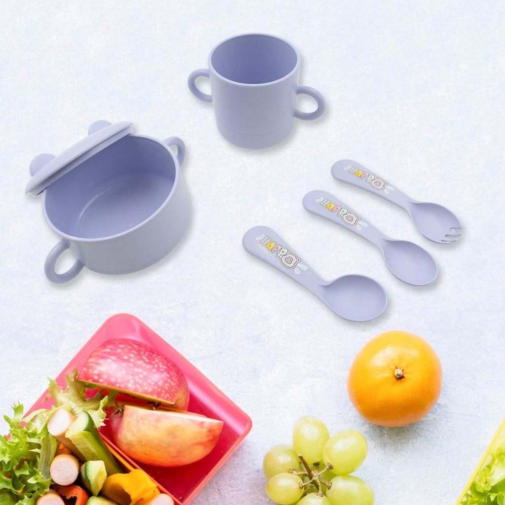 Individual components of the 7-piece bamboo fibre baby feeding set, including the cutlery and plate.