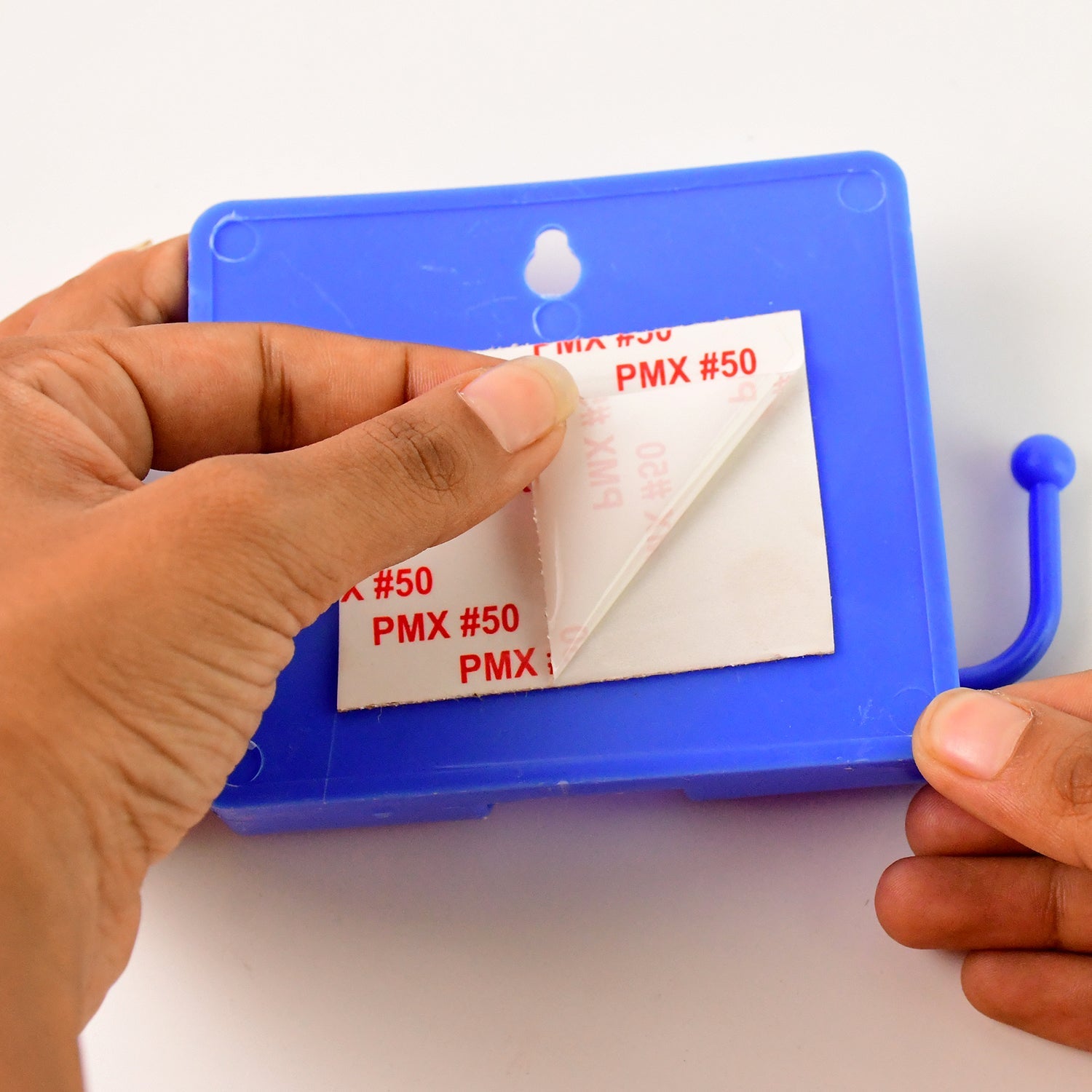 Compact blue wall mobile stand with hook for hanging items