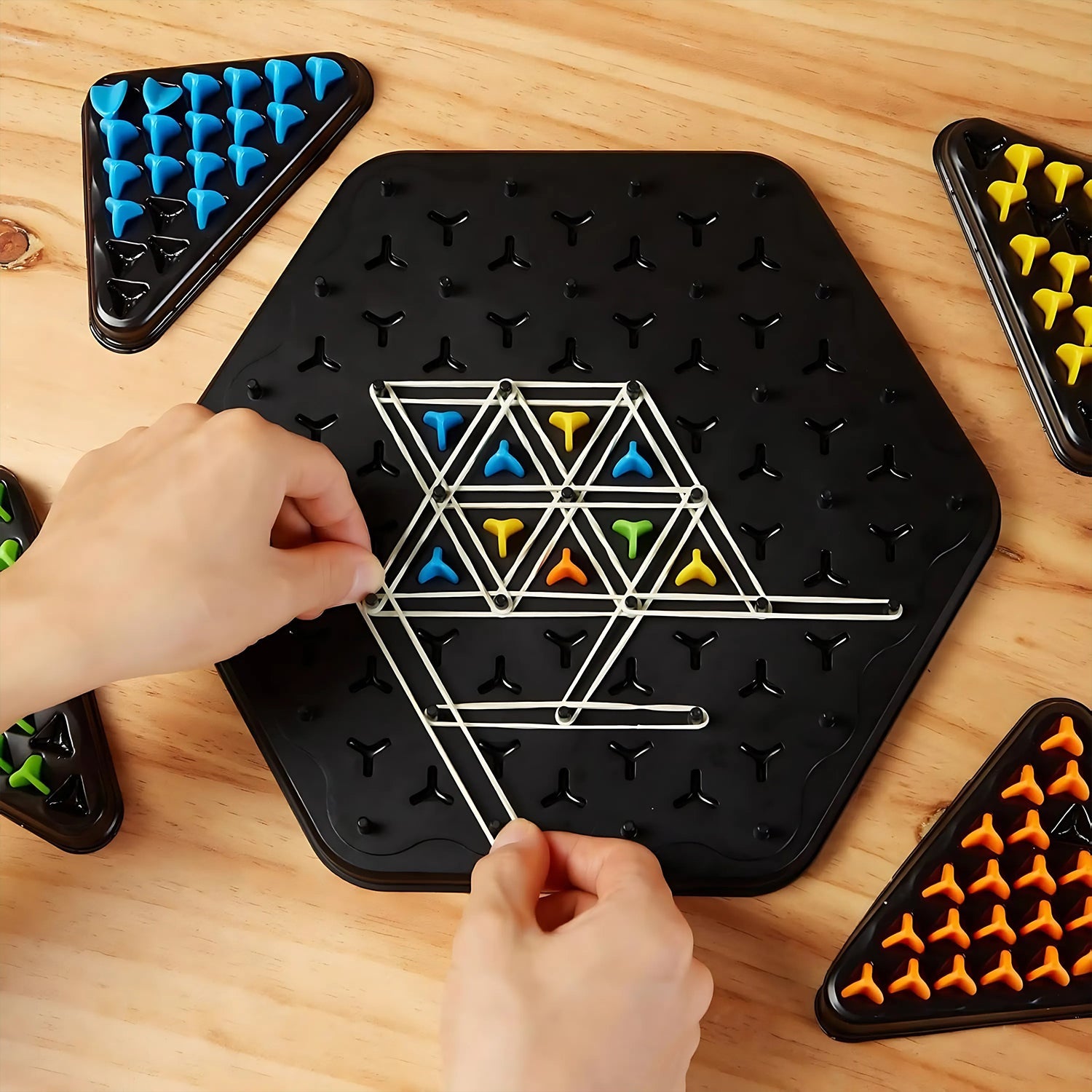 Components of the Triangle Color Matching Puzzle Board Game showing vibrant colored pegs