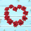 Velvet rose hair clip in vibrant red, perfect for adding a touch of elegance to any hairstyle.