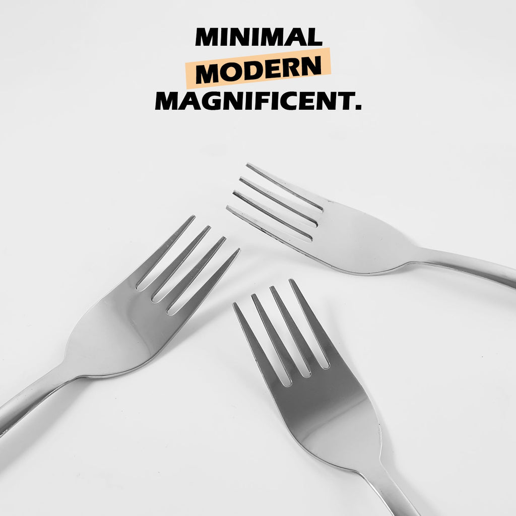 Stainless steel dinner forks featuring ergonomic handles for comfortable grip.