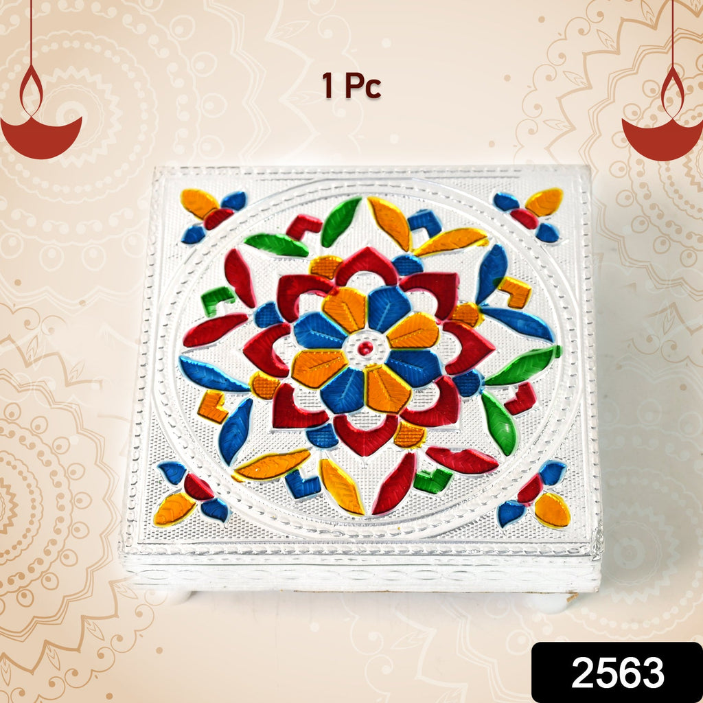 Close-up of the detailed Meenakari artwork on the side of the handmade wooden chowki.