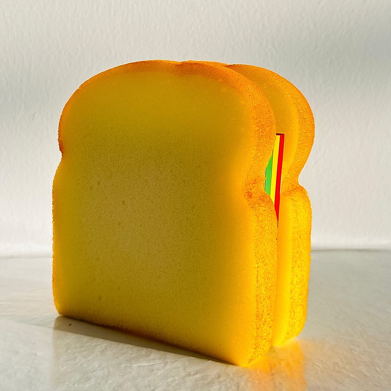 Side view of the unique sandwich-shaped memo notes stacked neatly.