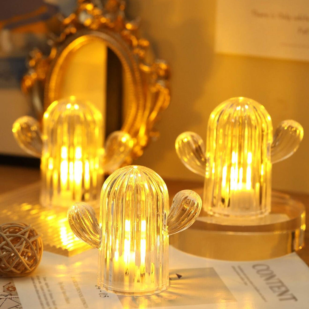Three cute cactus lights displayed together, showcasing their unique design and soft illumination.