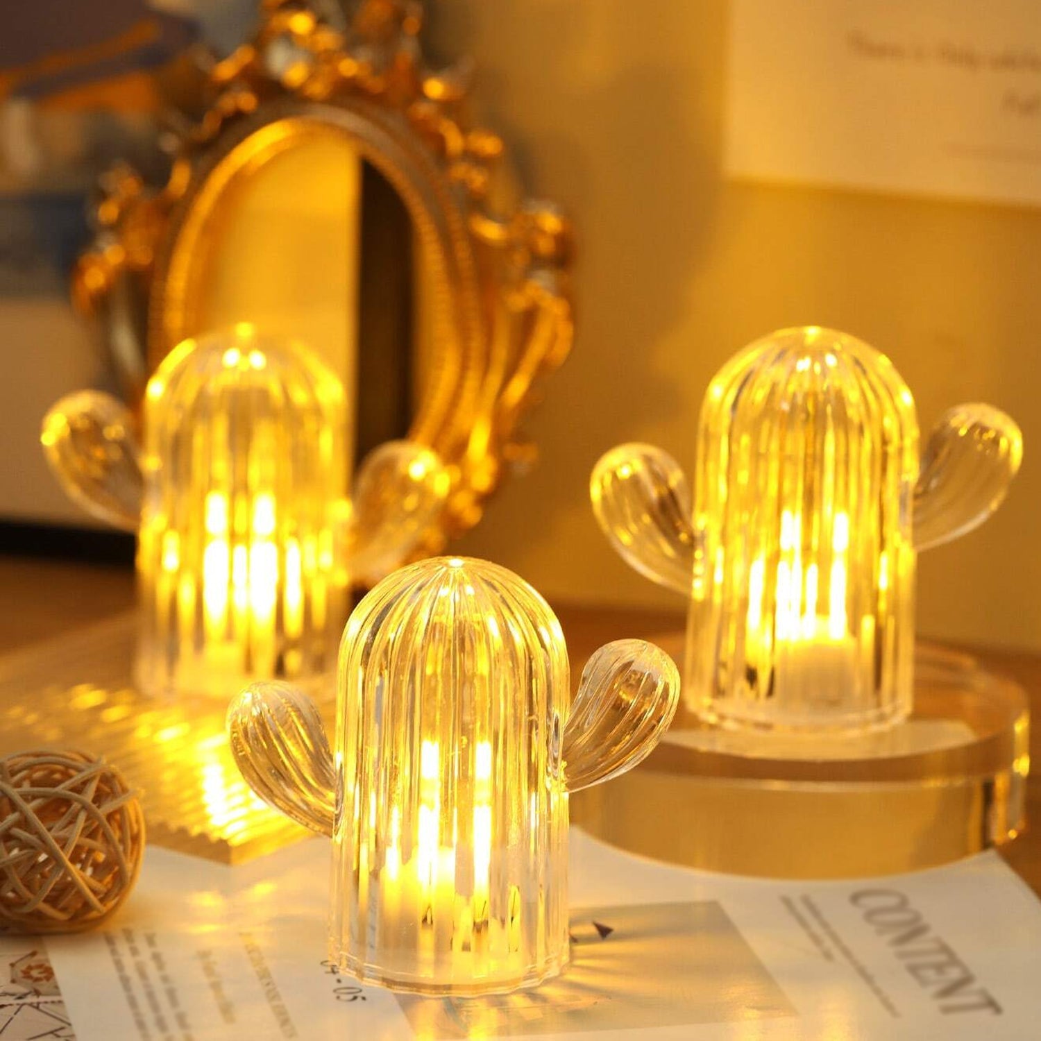 Three cute cactus lights displayed together, showcasing their unique design and soft illumination.