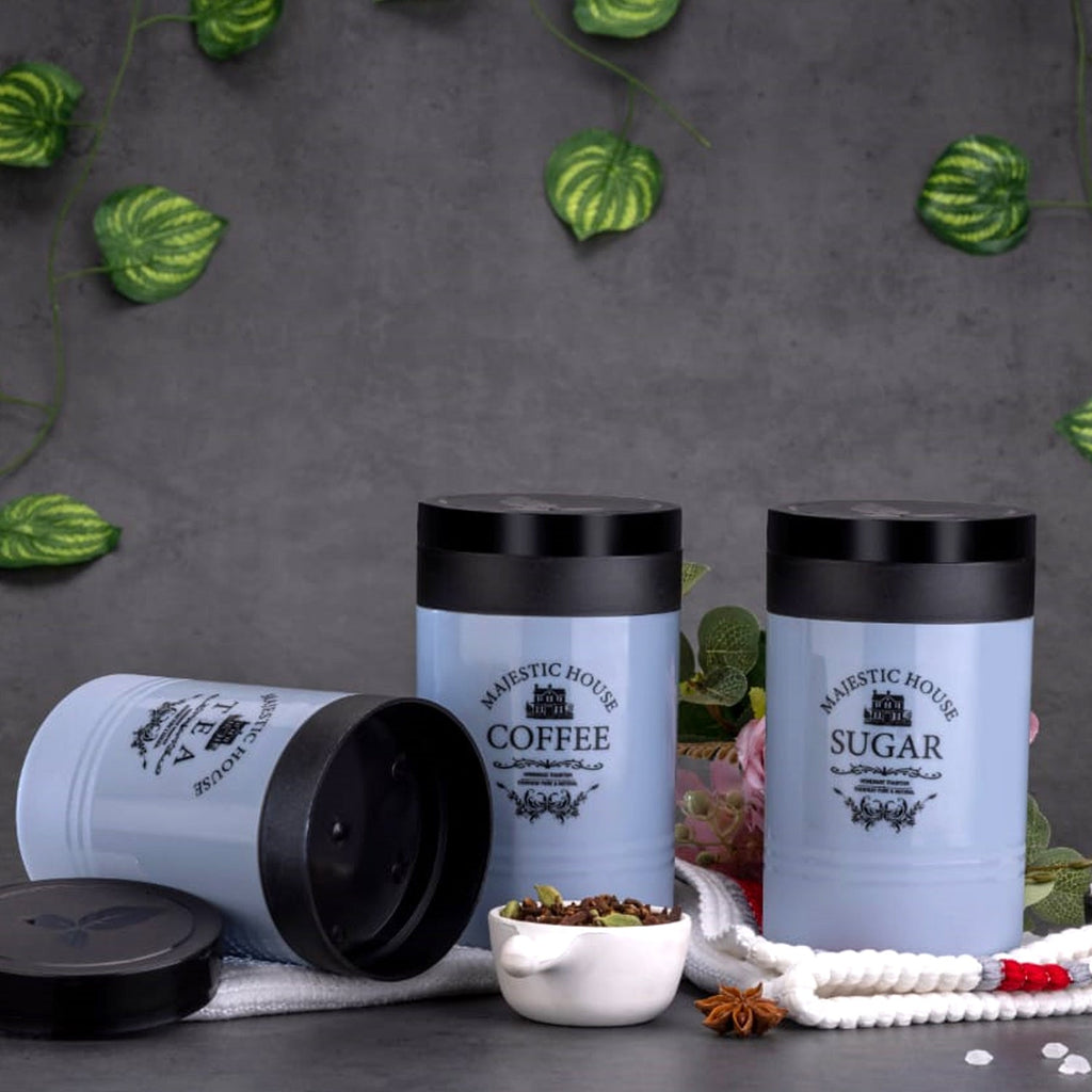 Three labeled airtight tea, coffee, and sugar containers, displayed from a slightly different angle.