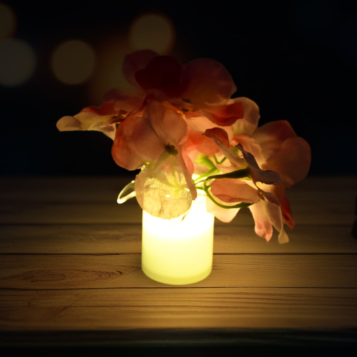 Four LED mood lights arranged decoratively on a table, showcasing their unique flower design.