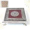 Silver Pooja Chowki with intricate Lakshmi design, perfect for Diwali celebrations.