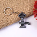 Premium metal Shiva Lingam keychain showing detailed Naag design