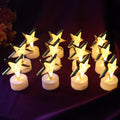 Set of star shaped flameless LED candles with golden outlines for elegant home décor