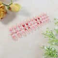 Elegant nude glossy artificial nail tips laid out in set