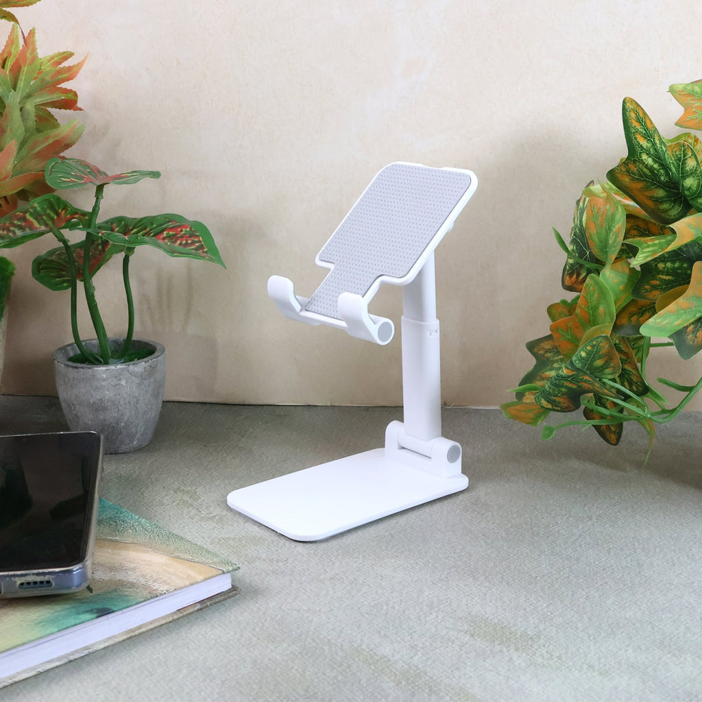 Foldable adjustable desktop mobile stand holding a smartphone securely