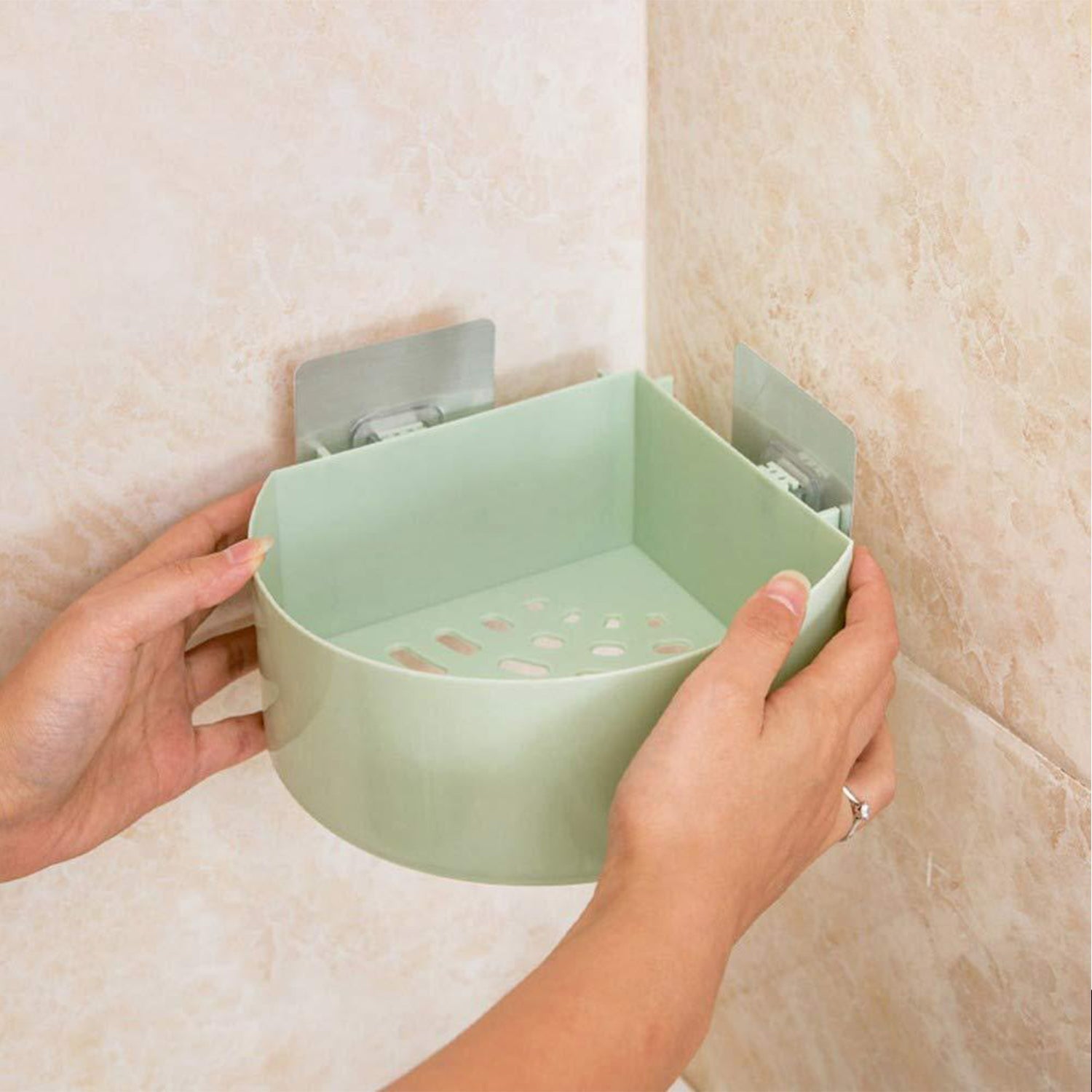 Wall holder rack installed in a bathroom, neatly holding everyday items.