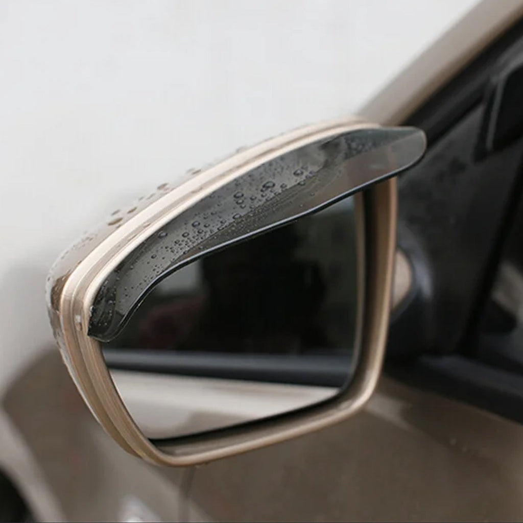 Rearview mirror of a car with the rain protector cover securely installed.