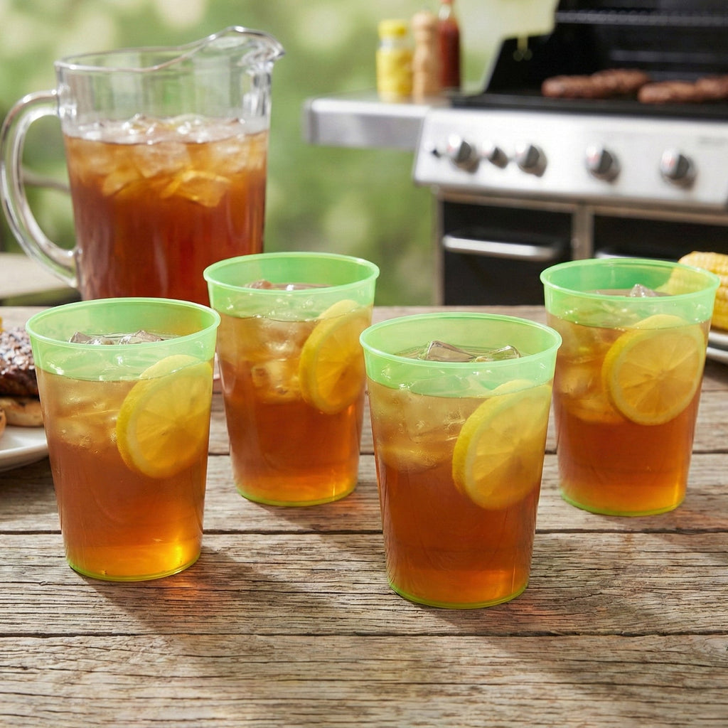 Four transparent reusable plastic drinking tumblers on display.