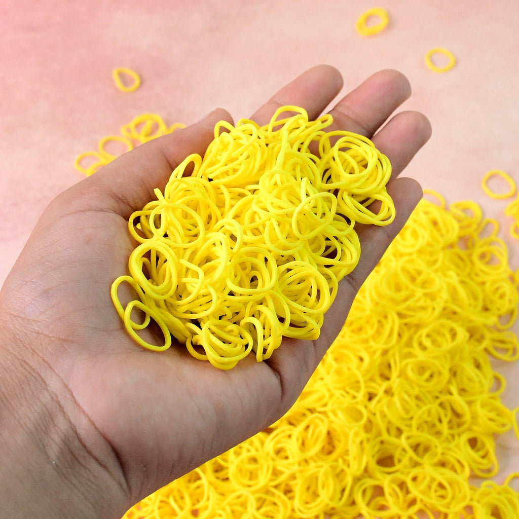 Close-up view of premium elastic rubber bands showing strong stretch