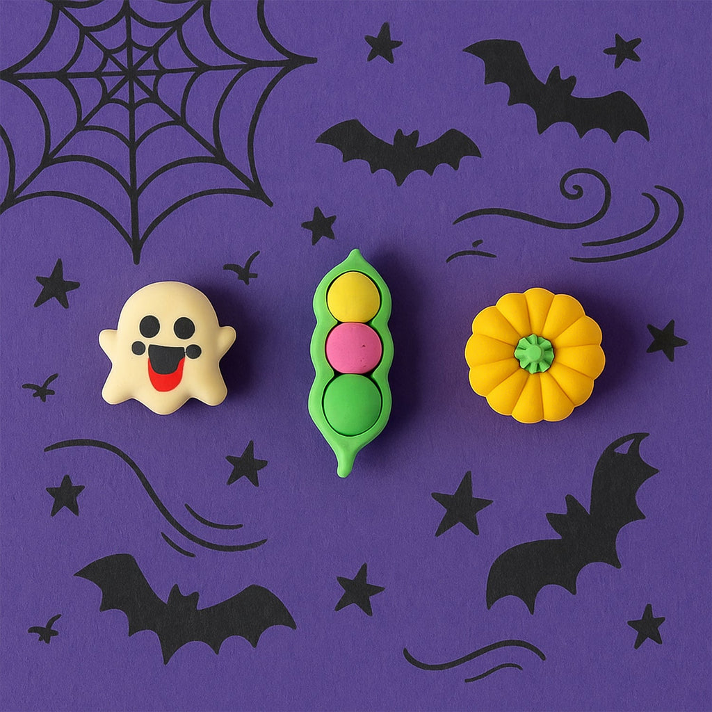 Multiple soft rubber cartoon erasers in different playful shapes, perfect for school stationery.