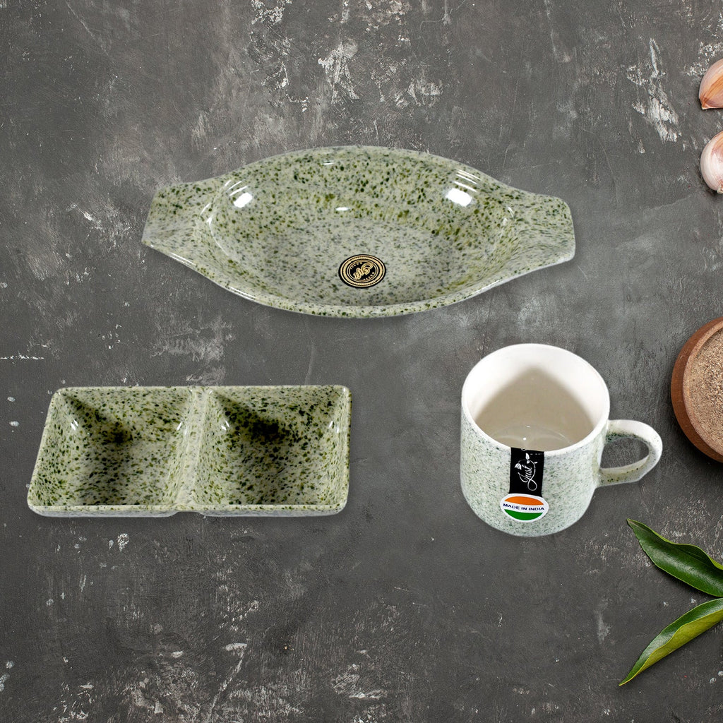 The versatile plastic snack platter and two-compartment chutney bowl from the Ceramic Snack & Tea Set, ready for serving.