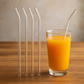 Pack of five reusable clear glass straws for environmentally conscious drinking