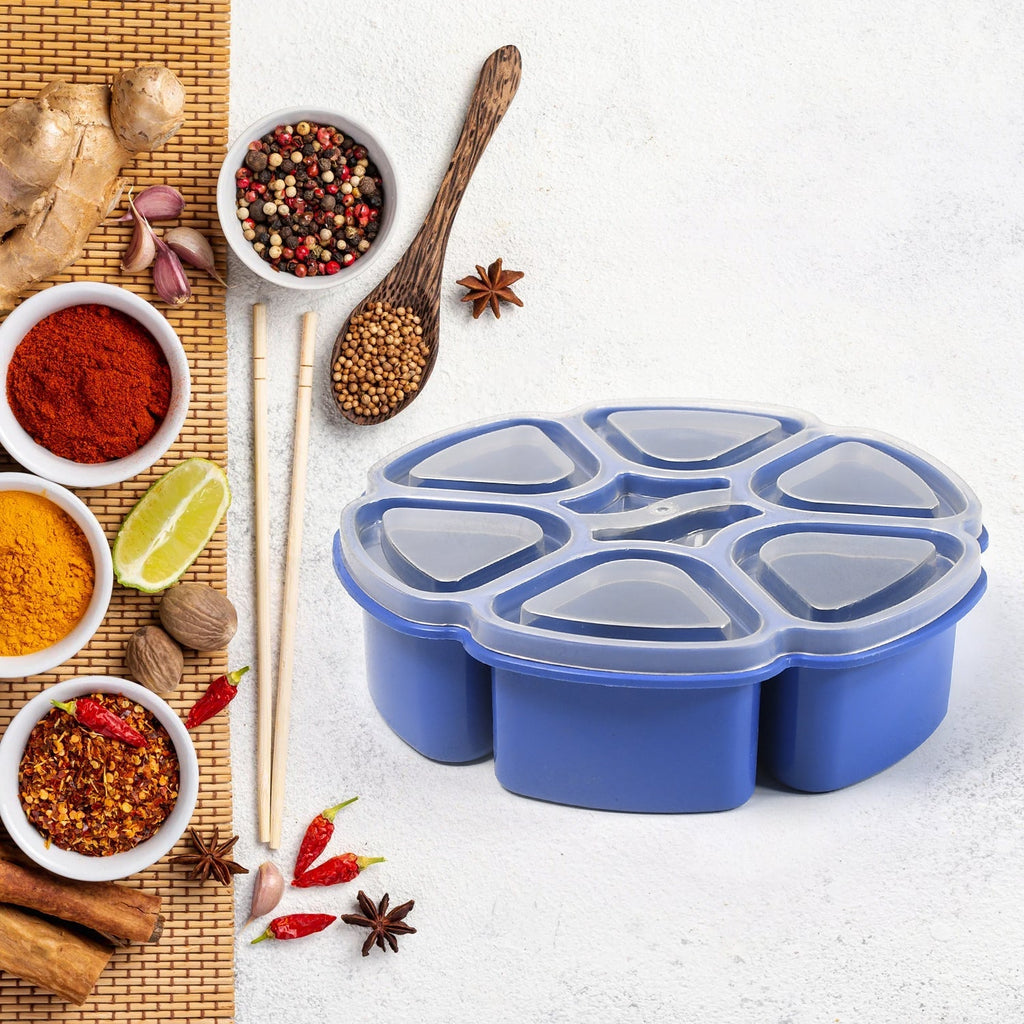 Side view of the plastic masala dabba with individual spice compartments.