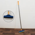 Versatile 2-in-1 long handle floor cleaning brush and wiper in action.
