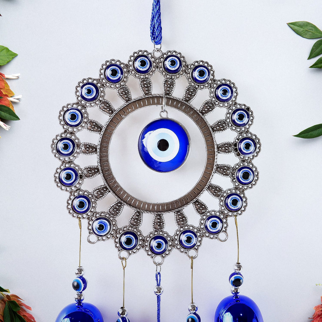 Full view of Om evil eye wind chime with soothing bells