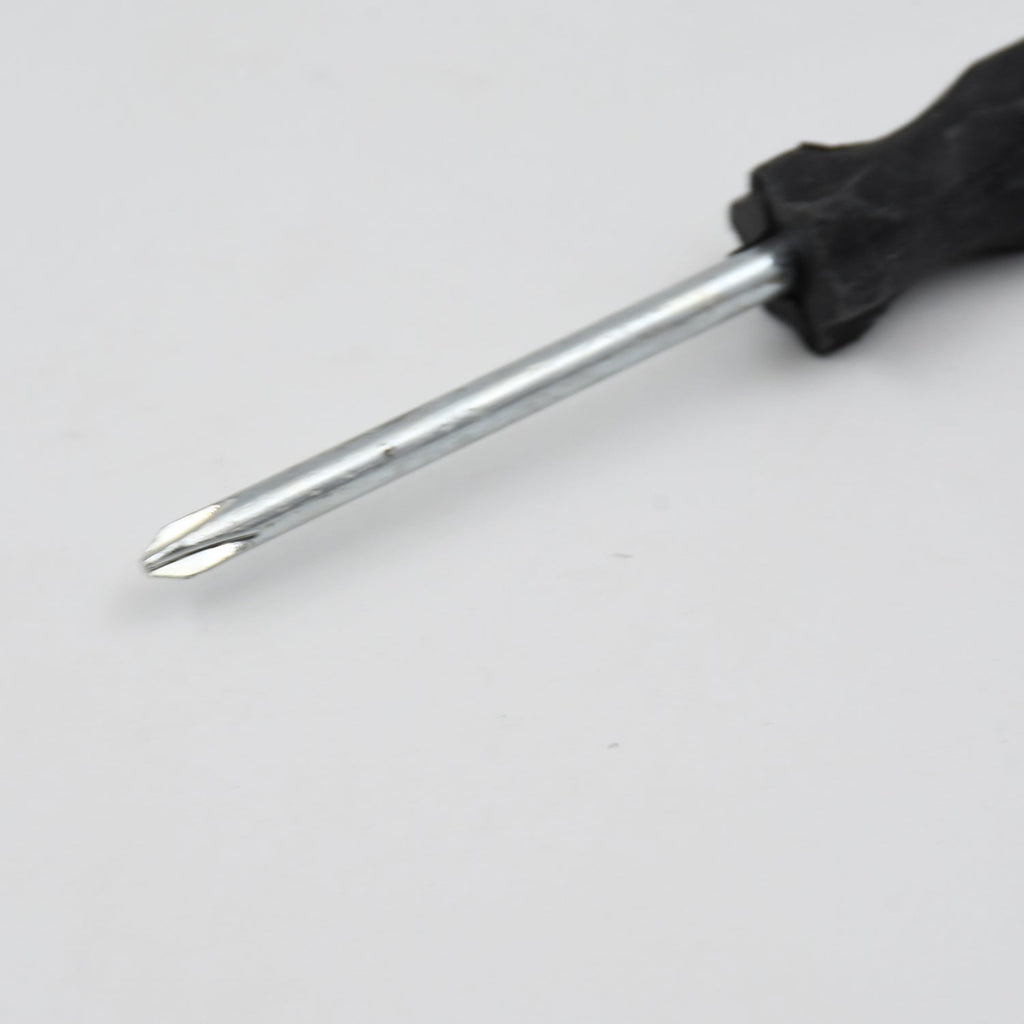 Set of small tools including the XcelGrip Phillips screwdriver.